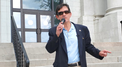 Candidate John Gentry speaking at a protest in front of the Hamilton County courthouse